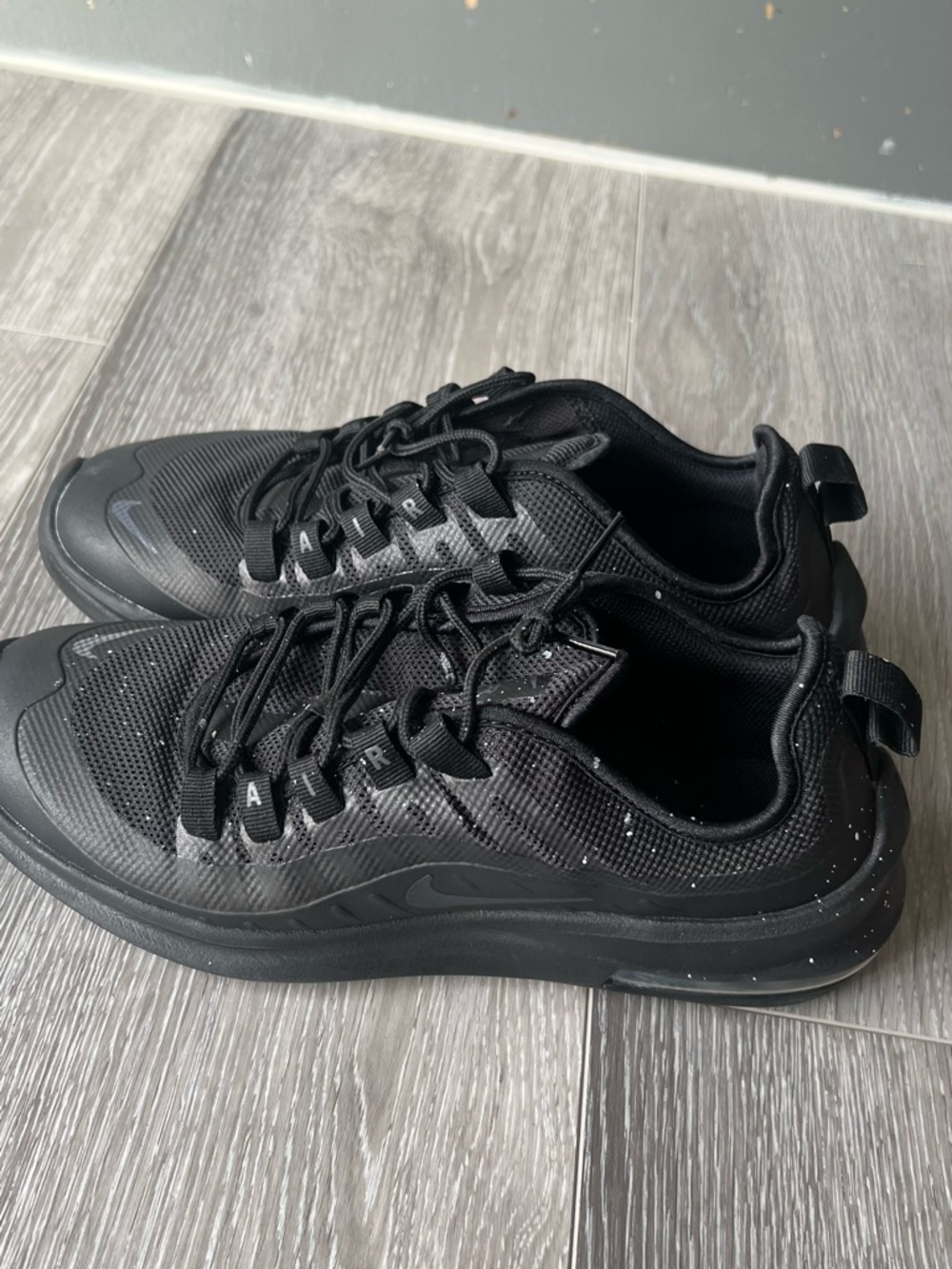Nike Black Low-Top Sneakers with White Speckle Accents